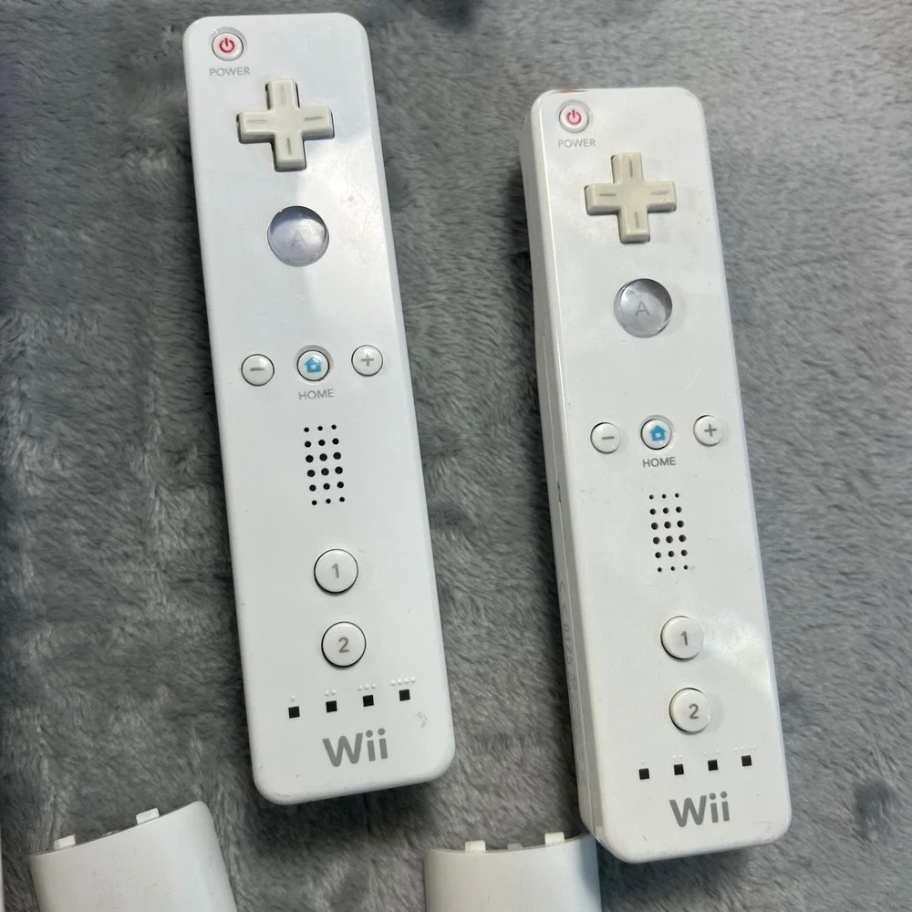 Nintendo Wii Bundle White Console 6‎ Games 2 Remotes Nunchucks Balance Board